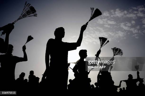 Bahraini Shiite Muslims take part in religious ceremonies commemorating Ashura, which marks the 7th century killing of Imam Hussein, grandson of...