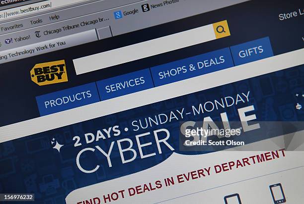In this photo illustration, Electronics retailer Best Buy advertises Cyber Monday sales on the store's website on November 26, 2012 in Chicago,...