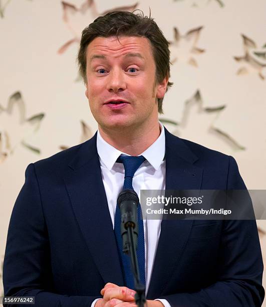 Jamie Oliver makes a speech as he, accompanied by Prince Charles, Prince of Wales, visits Carshalton Boys Sports College to see how the school has...