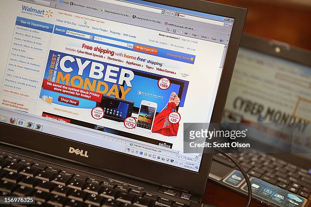 Retailers advertise Cyber Monday deals on their websites on November 26, 2012 in Chicago, Illinois. Americans are expected to spend $1.5 billion...