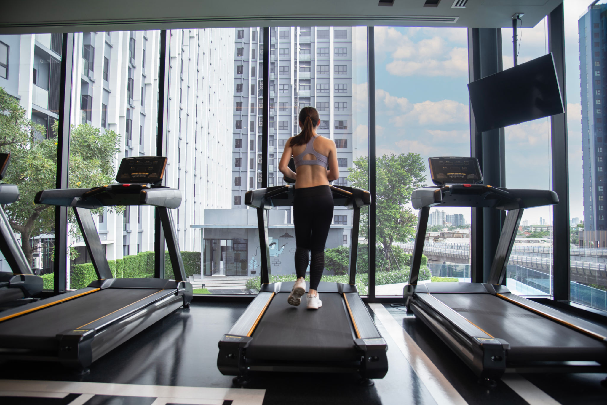 Asian woman exercise in the gym. Healthy and Lifestyle Concept. Asian woman exercise in the gym. Healthy and Lifestyle Concept.