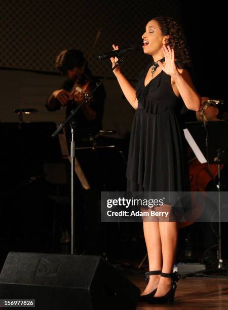 Israeli Singer Achinoam Nini, also known as Noa, performs with the Solis String Quartet at the Universitaet der Kuenste Berlin on November 26, 2012...