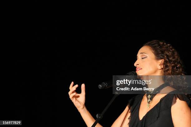 Israeli Singer Achinoam Nini, also known as Noa, performs with the Solis String Quartet at the Universitaet der Kuenste Berlin on November 26, 2012...