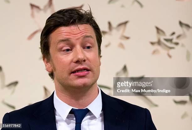 Jamie Oliver makes a speech as he, accompanied by Prince Charles, Prince of Wales, visits Carshalton Boys Sports College to see how the school has...