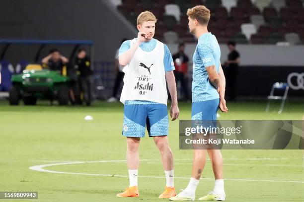 Kevin De Bruyne of Manchester City looks on during the Manchester City press conference & training session at National Stadium on July 25, 2023 in...