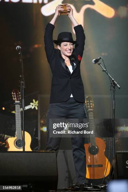 French singer Anais poses onstage as she receives the 'Prix Francis Lemarque' during the 'Grand Prix SACEM 2012' at Casino de Paris on November 26,...