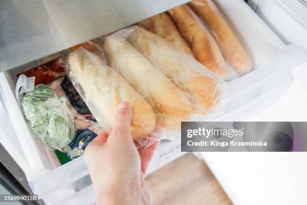 freezing baguettes - bun bread stock pictures, royalty-free photos & images