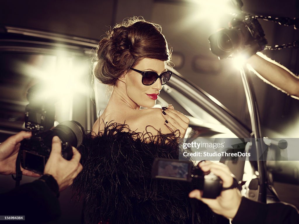 Glamorous Celebrity Woman Surrounded By Paparazzi Photographers