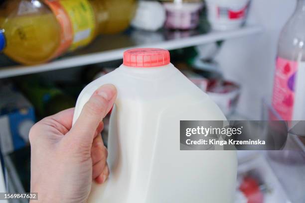 bottle of milk - beverage fridge stock pictures, royalty-free photos & images