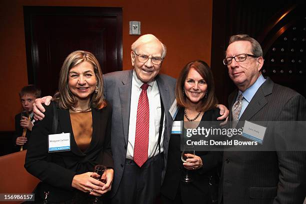 Margaret Sullivan, Warren Buffett, Cathy Baron-Tamraz and John Huey attend A Book Party For Tap Dancing To Work: Warren Buffett On Practically...