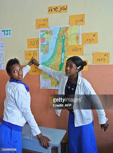 Children locate cities on a map of Israel at the primary school established by the Jewish Agency for Israel for Ethiopian Jews in Gondar, Ethiopia on...
