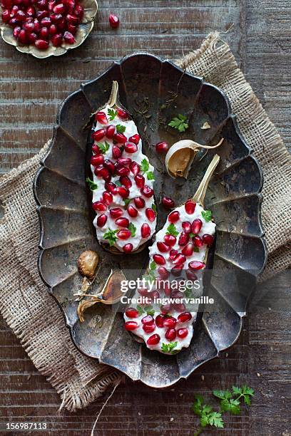 roasted eggplant with pomegranate - eggplant imagens e fotografias de stock