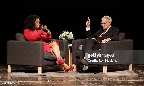 David Letterman and Oprah Winfrey attend "A Conversation With David Letterman And Oprah Winfrey" at Ball State University on November 26, 2012 in...