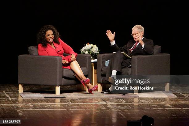 David Letterman and Oprah Winfrey attend "A Conversation With David Letterman And Oprah Winfrey" at Ball State University on November 26, 2012 in...