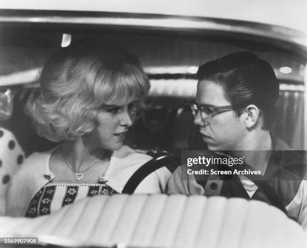 Candy Clark and Charles Martin Smith in a scene from the 1973 George Lucas film 'American Graffiti'.