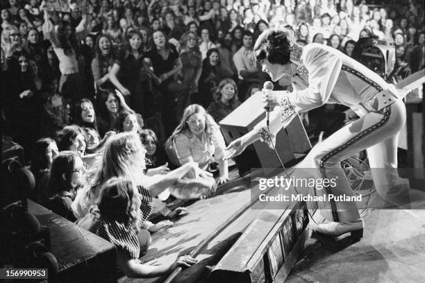 Donny Osmond from American pop group The Osmonds performs live on stage at the Rainbow Theatre, London, 4th November 1972.