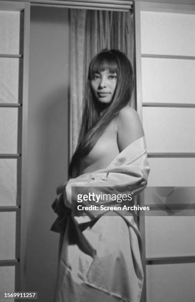Akiko Wakabayashi in a risque publicity pose for the 1967 James Bond movie 'You Only Live Twice' in her role as Aki.
