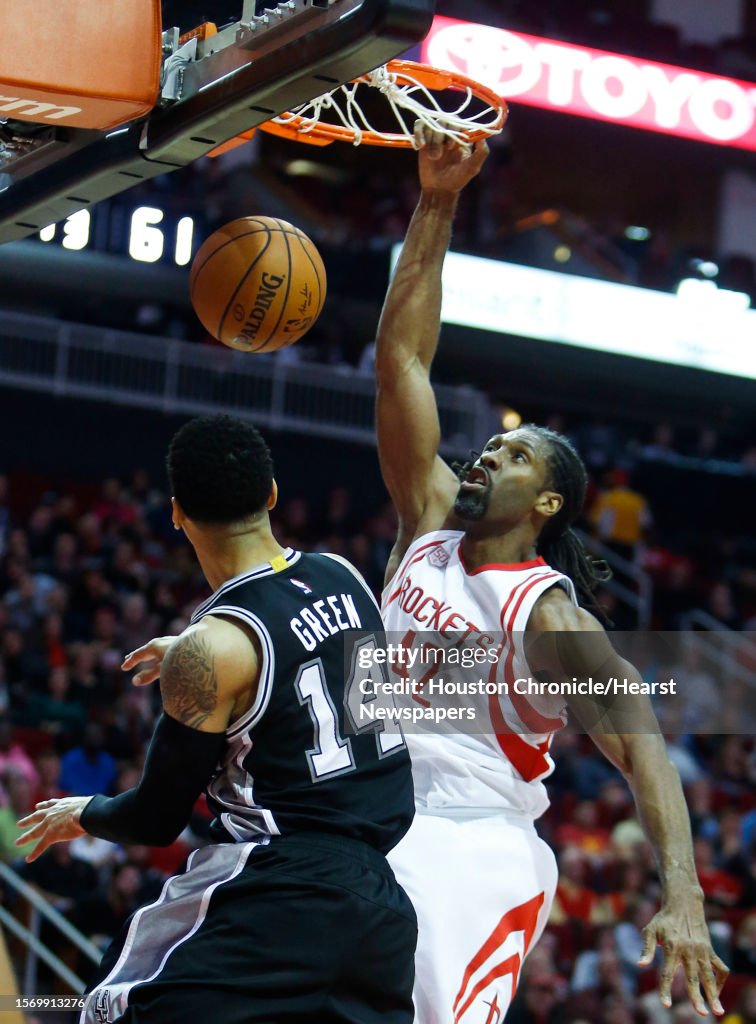 Mi Nene Rockets Houston Rockets center Nene Hilario scores on a dunk over San Antonio ...