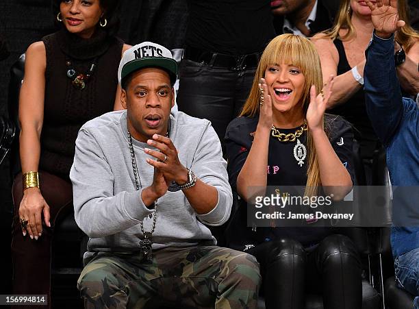 Jay-Z and Beyonce Knowles attend the New York Knicks vs Brooklyn Nets game at Barclays Center on November 26, 2012 in the Brooklyn borough of New...