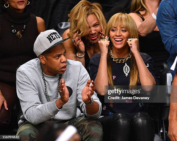 Jay-Z and Beyonce Knowles attend the New York Knicks vs Brooklyn Nets game at Barclays Center on November 26, 2012 in the Brooklyn borough of New...