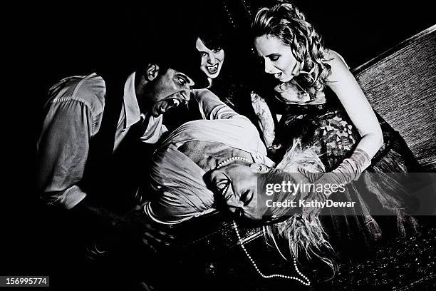 vampires and victim - roaring 20s stock pictures, royalty-free photos & images