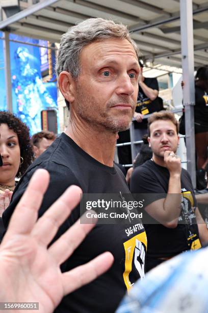 Tony Goldwyn attends as SAG-AFTRA members hold "Rock The City For A Fair Contract" rally in Times Square on July 25, 2023 in New York City. Members...