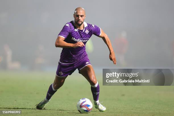 Sofyan Amrabat of ACF Fiorentina in action during the Pre-season Friendly match between Grosseto and Fiorentina at Stadio Olimpico on August 1, 2023...