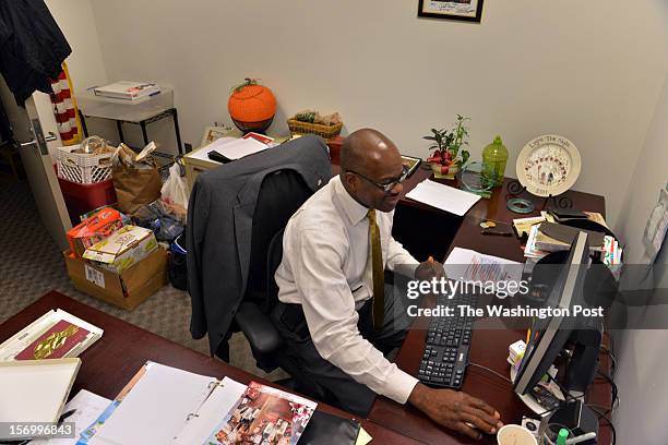 Jean Kabre's office, where he works as a concierge and event planner at 101 Constitution Avenue, houses donations for his home village on Tuesday,...