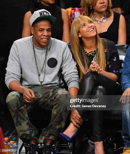 Jay-Z and Beyonce Knowles attend the New York Knicks v Brooklyn Nets game at Barclays Center on November 26, 2012 in the Brooklyn borough of New York...