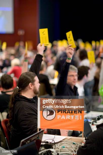 Voting participants at the Pirate Party National Convention at RuhrCongress on November 24, 2012 in Bochum, Germany. German Pirates have a lot to...