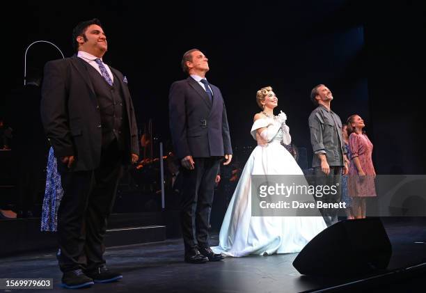 Cast members Nathan Amzi, Jeremy Secomb, Auli'i Cravalho, Matt Rawle and Emily Lane bow at the curtain call during the final performance of "Evita In...