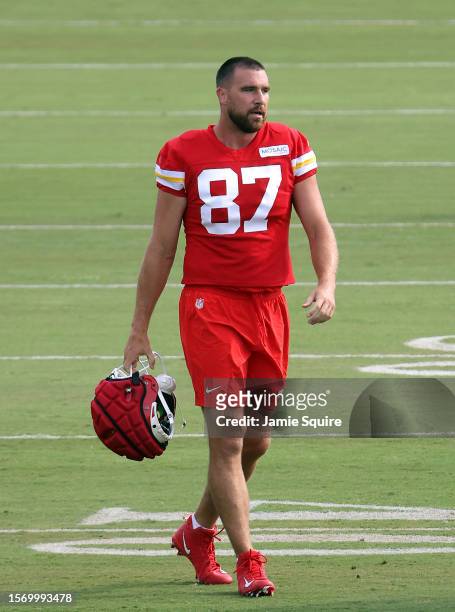 Tight end Travis Kelce of the Kansas City Chiefs walks onto the field during Kansas City Chiefs Training Camp on July 25, 2023 in St Joseph, Missouri.