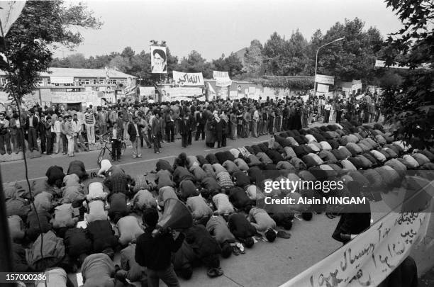 Prayer in front of the US embassy where 54 hostages are held by Islamist students on November 7, 1979 in Tehran, Iran.