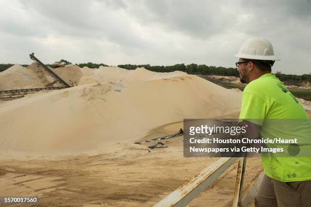 David Heagle, plant manager, looks across the Superior Silica Sands sand mine on Tuesday, March 28 in Kosse, Texas. Demand for sand is surging as oil...