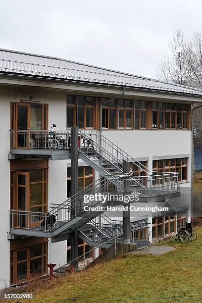 Wheelchairs sit next to stairs at a Caritas employment facility for handicapped where a fire killed 14 people on November 27, 2012 in...