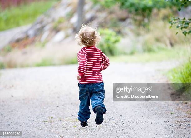 running toddler - dag 2 stock pictures, royalty-free photos & images