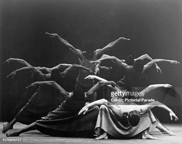 Dancers on stage during a performance of 'Revelations' by Alvin Ailey American Dance Theater, United States, circa 1965. The piece was choreographed...