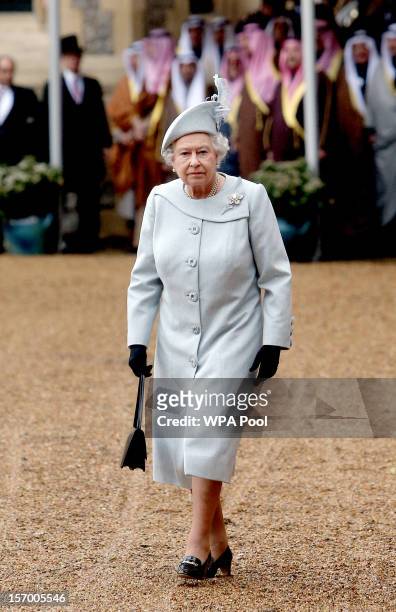 Queen Elizabeth II attends the ceremonial arrival of Amir Sheikh Sabah Al-Ahmad Al-Jaber Al-Sabah of Kuwait at Windsor Castle during a three-day...