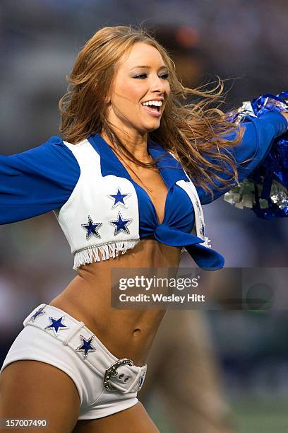 Dallas Cowboys cheerleader performs during a game against the Cleveland Browns at Cowboys Stadium on November 18, 2012 in Arlington, Texas. The...