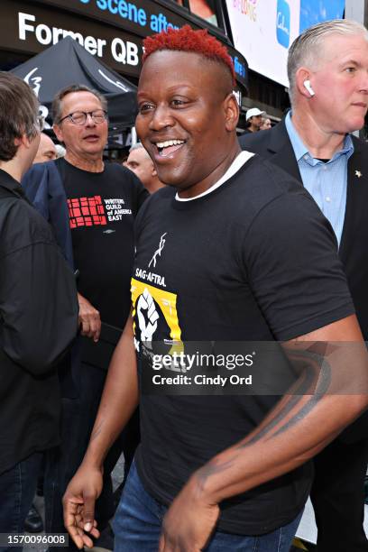 Tituss Burgess attend as SAG-AFTRA members hold "Rock The City For A Fair Contract" rally in Times Square on July 25, 2023 in New York City. Members...