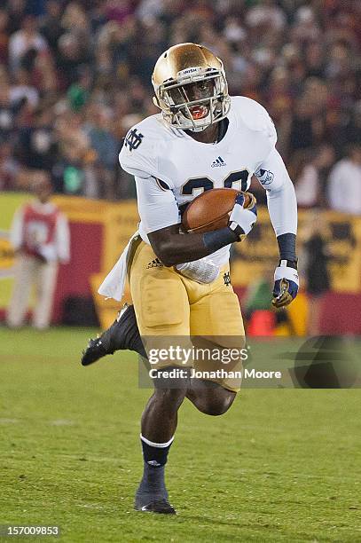 Cierre Wood of the Notre Dame Fighting Irish runs the ball during a 22-13 victory over the USC Trojans at Los Angeles Memorial Coliseum on November...