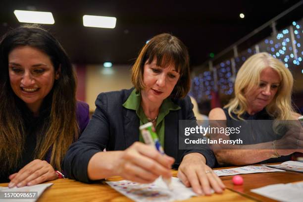 Rachel Reeves , Labour’s Shadow Chancellor of the Exchequer, plays bingo as she visits Primrose Valley Holiday Park on July 25, 2023 in Filey,...