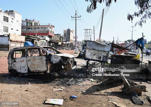 View of damaged vehicle at Ambedkar chowk in Sohna, where a mob attacked on Monday afternoon near Bus stand on August 1, 2023 in Nuh, India. Five...
