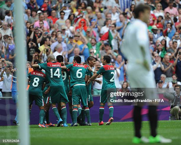 The players of Mexico celebrate their second goal during the Men's Football Gold Medal match between Brazil and Mexico on Day 15 of the London 2012...
