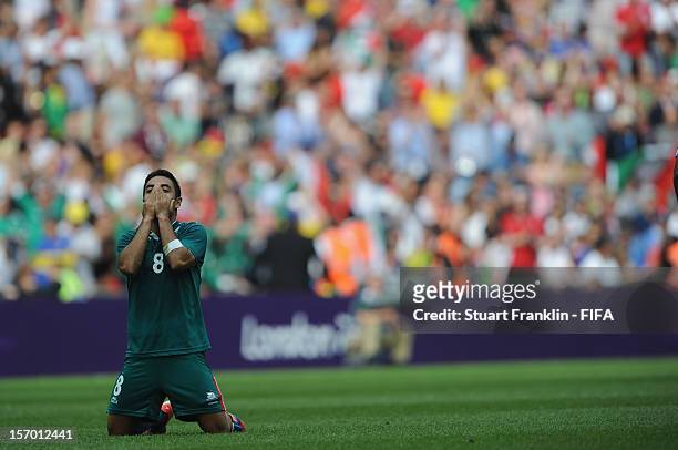 Marco Fabian of Mexico celebreates at the end of the Men's Football Gold Medal match between Brazil and Mexico on Day 15 of the London 2012 Olympic...