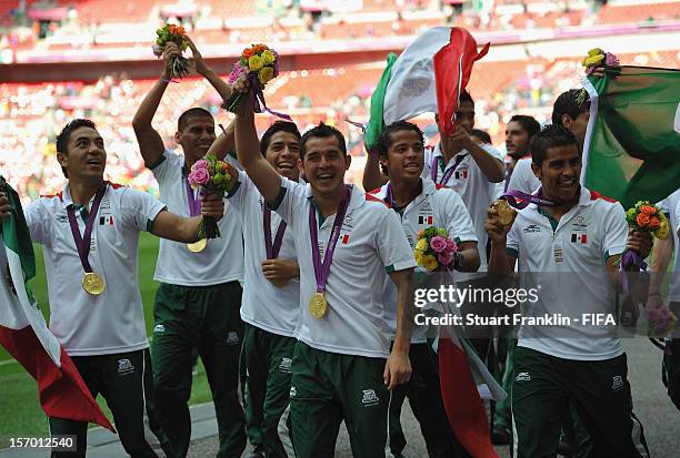 The players of Mexico celebrate at the end of the Men's Football Gold Medal match between Brazil and Mexico on Day 15 of the London 2012 Olympic...