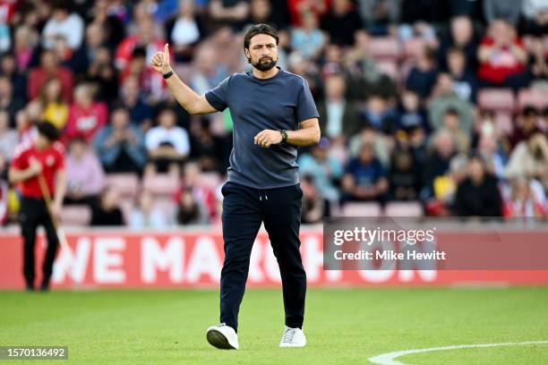 Russell Martin, Manager of Southampton FC, acknowledges the fans prior to the pre-season friendly match between Southampton and Bournemouth at St...