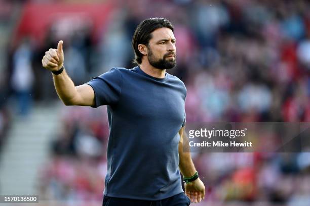 Russell Martin, Manager of Southampton FC, acknowledges the fans prior to the pre-season friendly match between Southampton and Bournemouth at St...