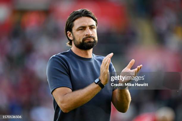 Russell Martin, Manager of Southampton FC, acknowledges the fans prior to the pre-season friendly match between Southampton and Bournemouth at St...