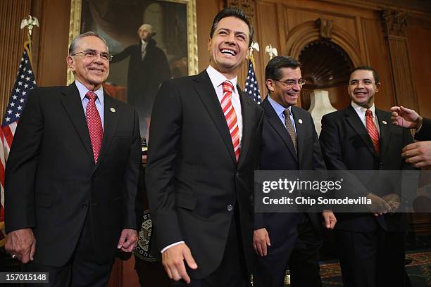 Mexican President-Elect Enrique Pena Nieto shares a laugh with members of Congress Rep. Ruben Hinojosa , Rep. Xavier Becerra and Rep. Henry Cuellar...